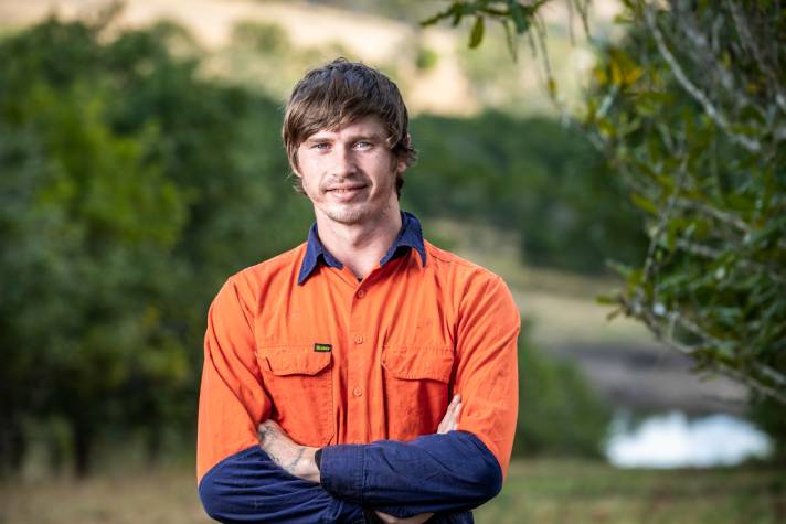 Male employee looking to camera