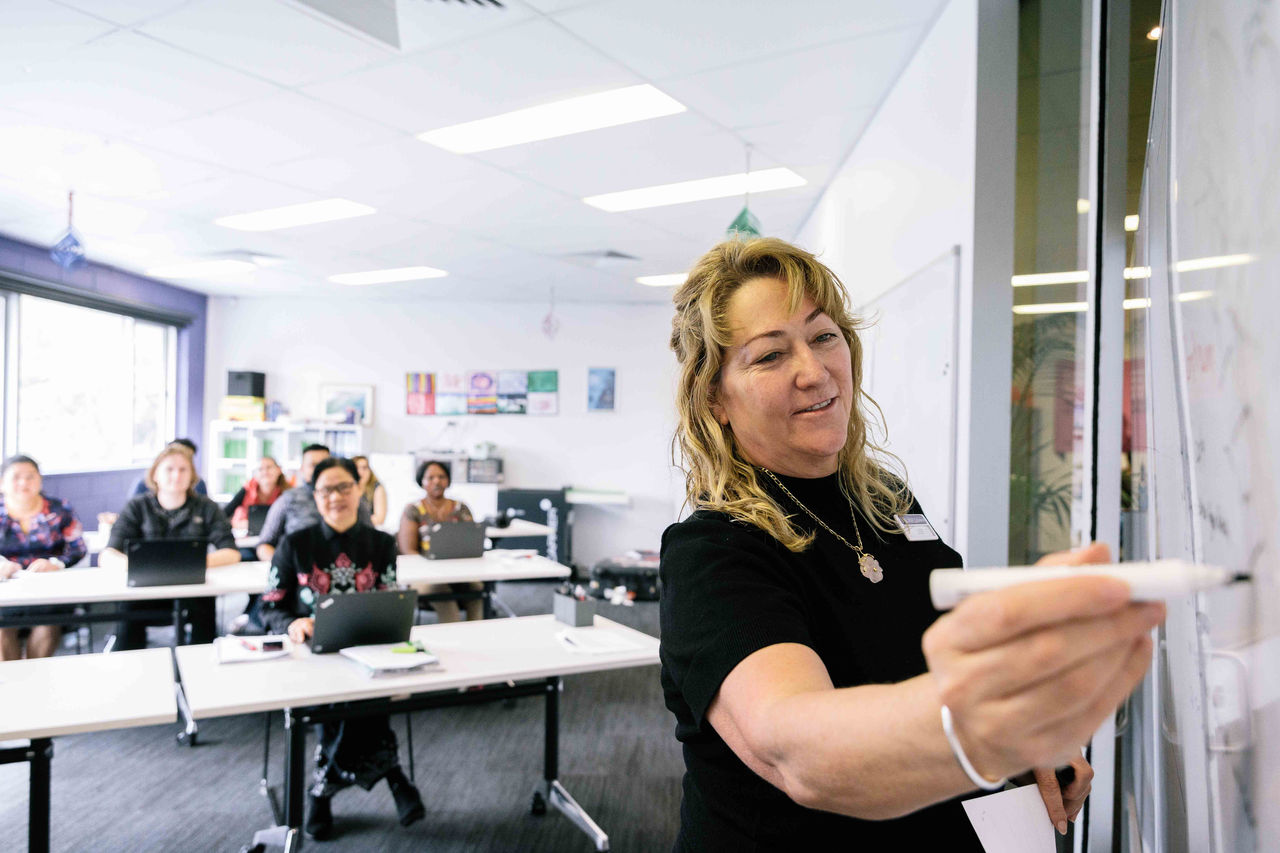 female training team member teaching class