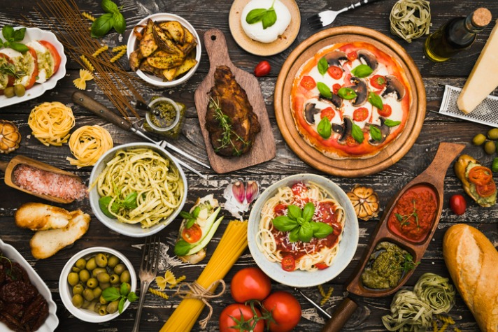 The Mediterranean diet - image of a range of foods associated with the Mediterranean diet spread on a table