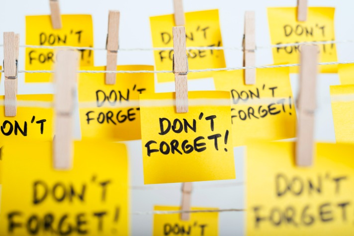 Sticky notes on clothesline titled "don't forget".
