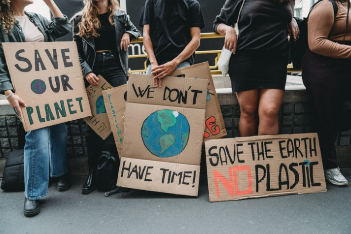 Climate change distress - image of various people protesting for climate action