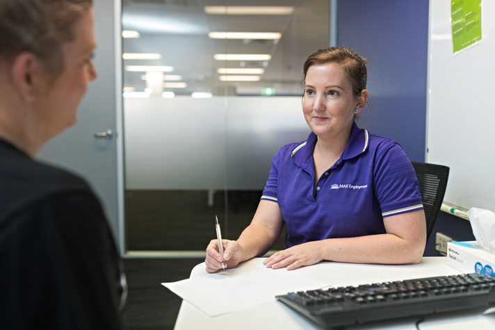 female Health Team member supporting customer